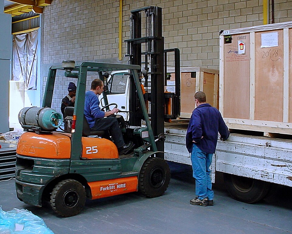Counterbalance forklift moving materials